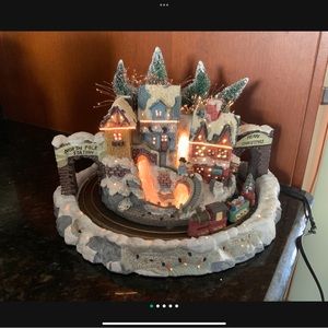 Fiber optic winter village with moving train